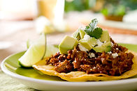 Tostada with meat and avocado